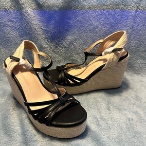 Elegant Black and Tan Wedge Sandals